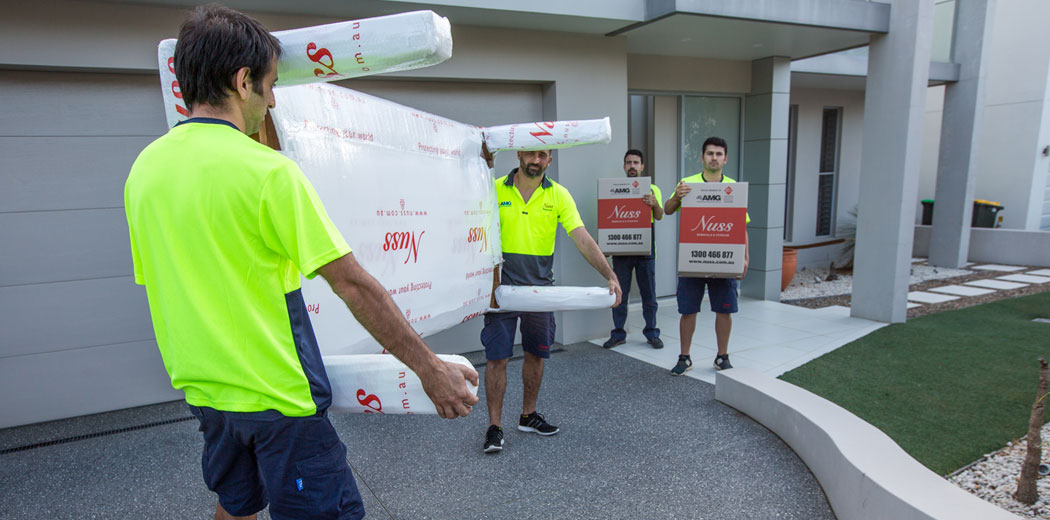 people-behind-nuss NUSS Staff moving Boxes